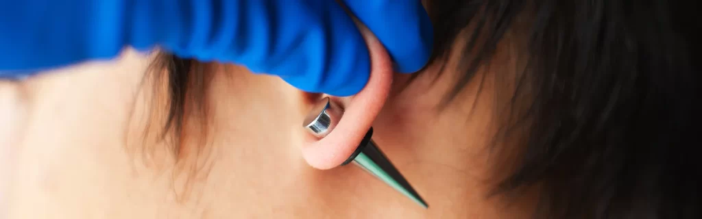 Woman with ear piercing